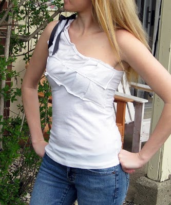 http://thegogreenblog.com/diy-one-shoulder-tank-from-long-sleeved-t-shirt/